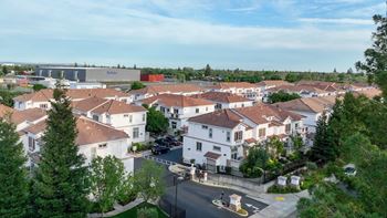 A residential area with houses and a street.
